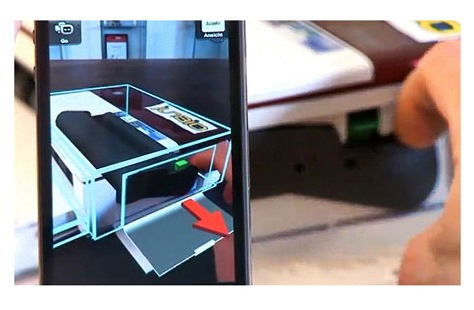 Augmented reality als handleiding: een overliggend videobeeld laat zien hoe het inktpatroon van een printer gewisseld kan worden